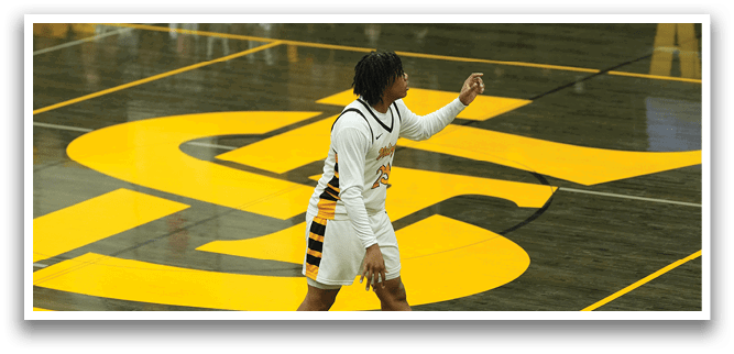 A basketball player in a white uniform is holding a ball on the court. AI generated content