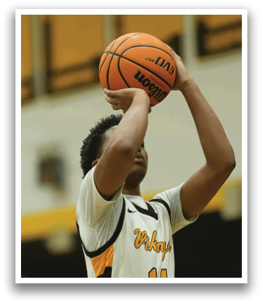 A basketball player is holding a basketball in his hands, looking up at the basket. AI generated content