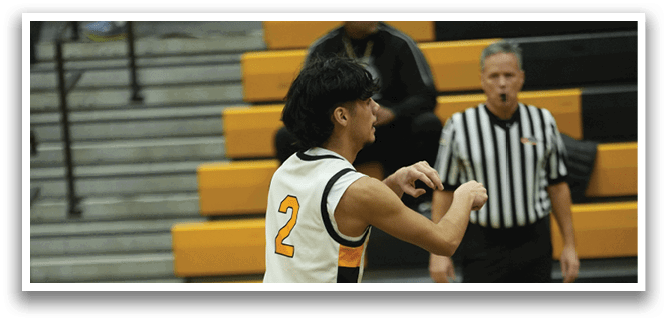 A basketball player wearing a white and yellow jersey is walking on the court. AI generated content
