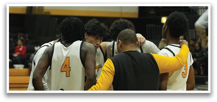 A group of basketball players huddle together on the court, discussing their game strategy. AI generated content