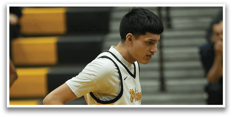 A basketball player wearing a white and black uniform stands on the court. AI generated content