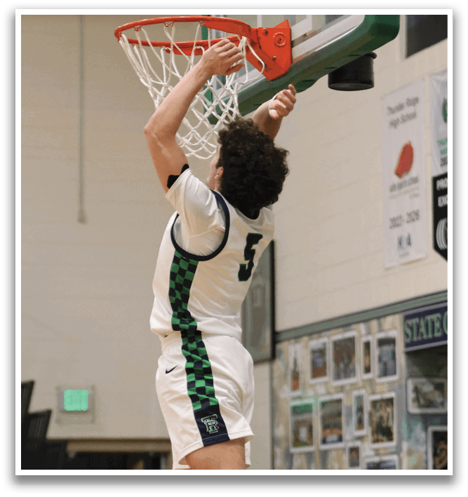 A basketball player is jumping in the air to hit the ball. AI generated content