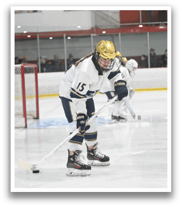 A female ice hockey player with a gold helmet and a number 15 on her jersey is holding a hockey stick. AI generated content