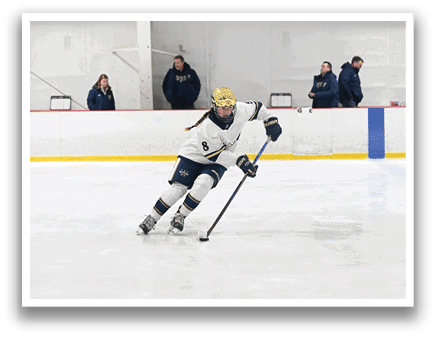 A female ice hockey player is skating on the ice, holding a stick in her hand. AI generated content