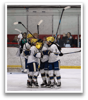 A group of hockey players hugging each other on the ice. AI generated content