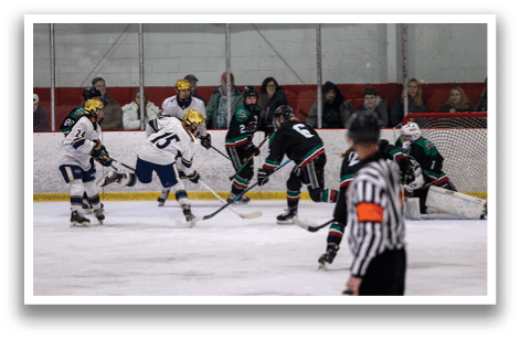 A group of people playing hockey on an ice rink. AI generated content