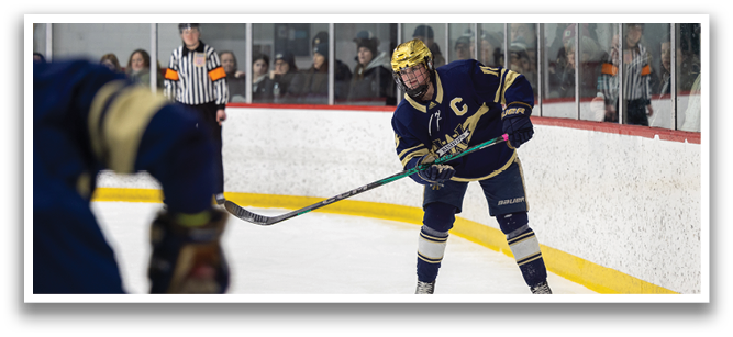 A hockey player in a blue uniform is holding a green stick and preparing to shoot the puck. AI generated content