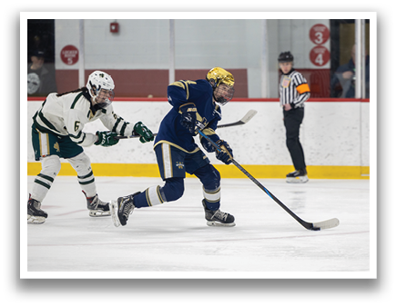 Two hockey players on the ice, one with a blue shirt and the other with a green shirt. The blue shirt player is holding a stick and appears to be getting ready to shoot the puck. AI generated content