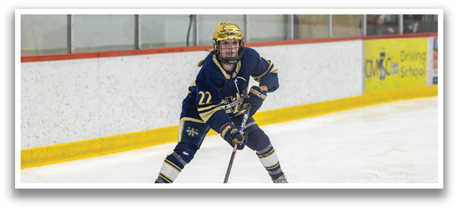 A hockey player in a blue uniform is holding a stick on the ice. AI generated content