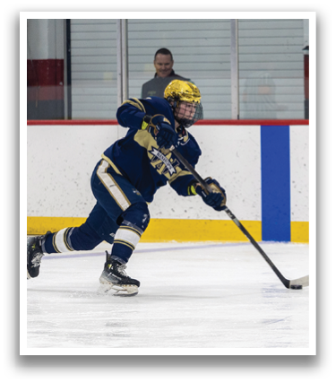 A hockey player in a blue uniform is skating on the ice, holding a hockey stick. AI generated content
