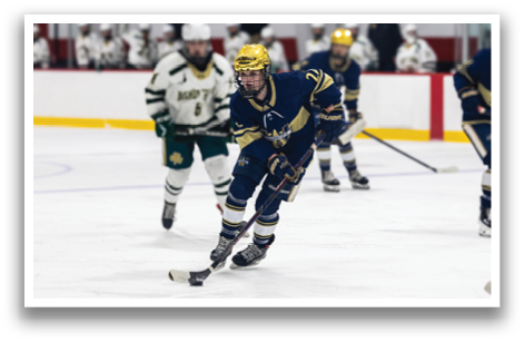 A hockey player in a blue uniform is skating on the ice with a hockey stick. AI generated content