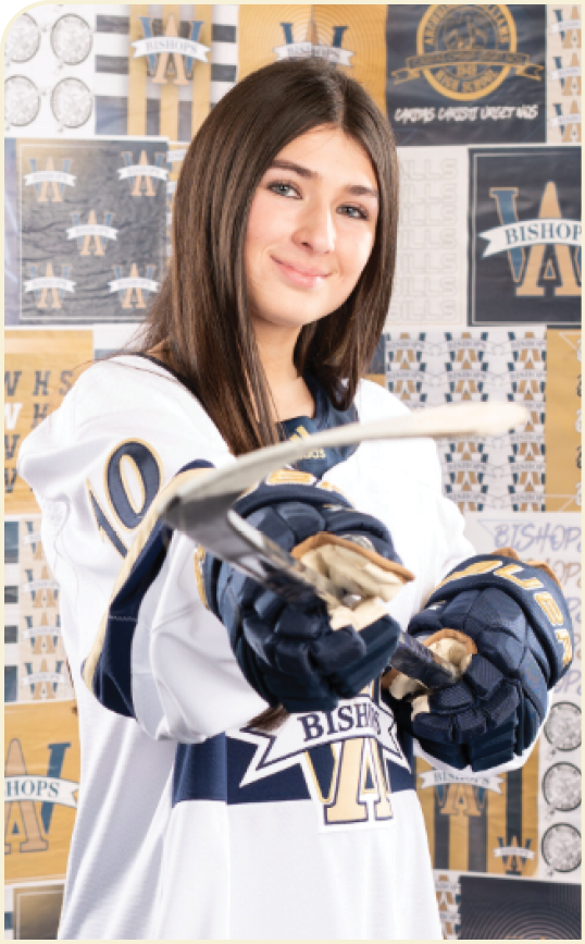 A woman wearing a hockey jersey holds a hockey stick. AI generated content