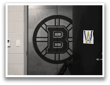 A black and white image of a Bruins logo on a wall. AI generated content