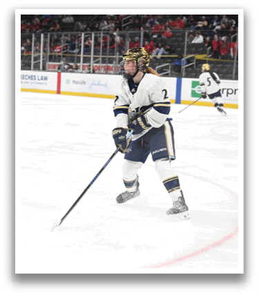 A hockey player with a stick in his hand is standing on the ice. AI generated content