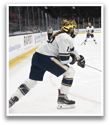 A hockey player in a blue and white uniform is on the ice, holding a hockey stick. AI generated content