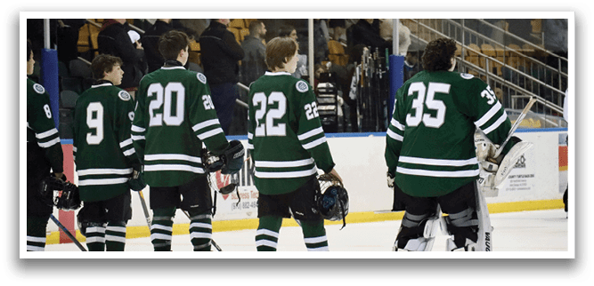 A group of hockey players in green uniforms are standing on the ice. AI generated content