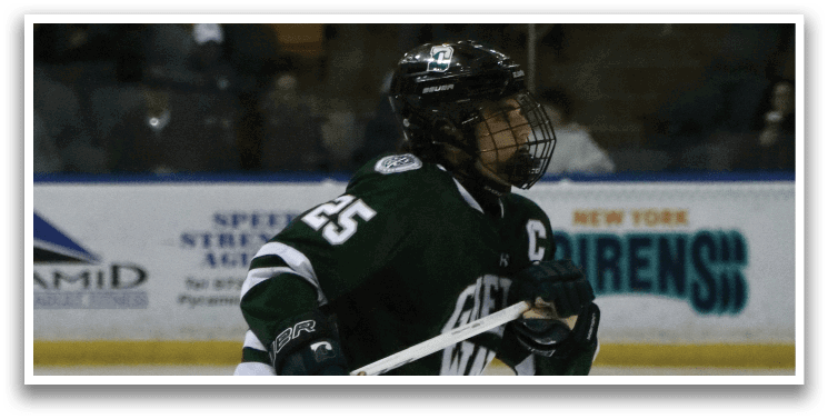 A hockey player in a green and white uniform is on the ice, holding a stick. AI generated content