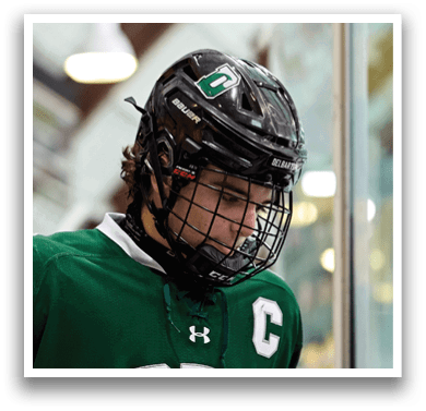 A hockey player wearing a green jersey with the number 14 on it. AI generated content