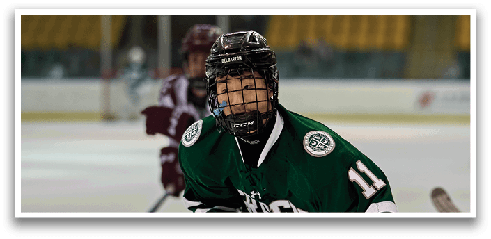 A hockey player wearing a green jersey with the number 11 on it. AI generated content