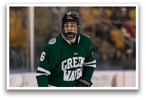 A hockey player wearing a green and white uniform is holding a hockey stick and skating on the ice. AI generated content