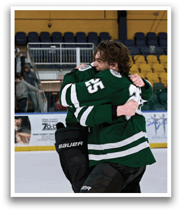 Two hockey players embrace each other on the ice. AI generated content