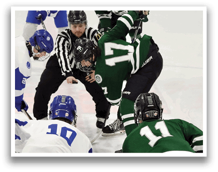 A group of hockey players are on the ice, with one player kneeling down and another player bending over him. The players are wearing green and white uniforms. AI generated content