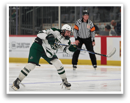 A hockey player in a white and green uniform is holding a hockey stick and getting ready to shoot the puck. AI generated content