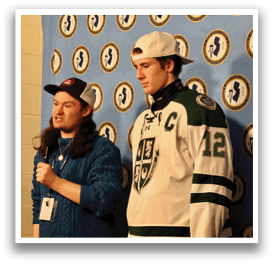 Two men are standing in front of a backdrop, one wearing a white hat and the other wearing a hockey jersey. AI generated content