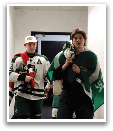 Three hockey players wearing green and white uniforms are walking down a hallway. AI generated content