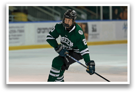 A hockey player in a green and white uniform is holding a hockey stick and skating on the ice. AI generated content