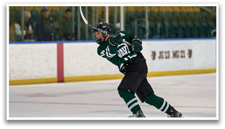 A hockey player in a green and white uniform is skating on the ice. AI generated content