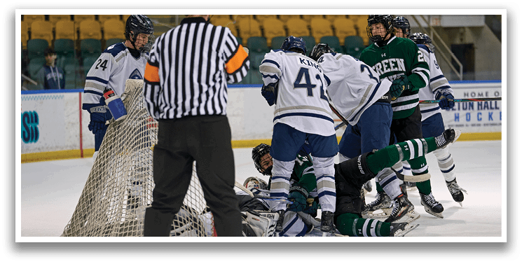 A group of hockey players on the ice, with one player falling to the ground. AI generated content