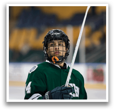 A hockey player wearing a green jersey holds a white hockey stick. AI generated content