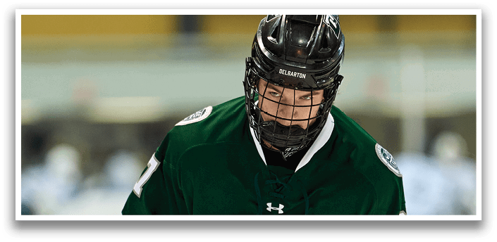 A man wearing a green and black hockey jersey with the number 2 on it. AI generated content