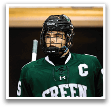 A hockey player wearing a green jersey with the number 5 on it. AI generated content