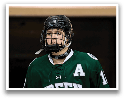 A hockey player wearing a green jersey with the number 11 on it. AI generated content