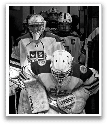 A group of hockey players are standing in a hallway, with one player holding a hockey stick. AI generated content