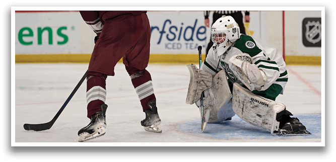 A hockey game is in progress with a player in a red jersey about to shoot the puck. AI generated content