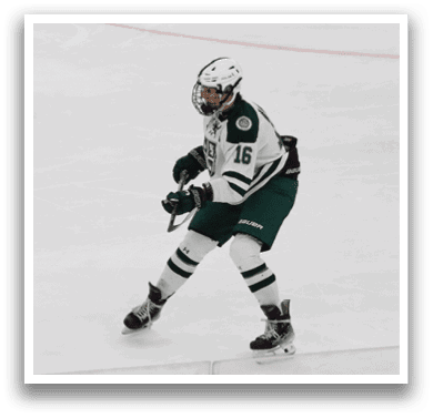 A hockey player in a green and white uniform is standing on the ice, holding a hockey stick. AI generated content