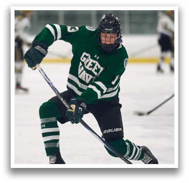 A hockey player in a green uniform is holding a stick and skating on the ice. AI generated content