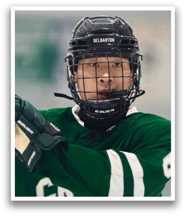 A hockey player wearing a green jersey with the number 8 on it. AI generated content