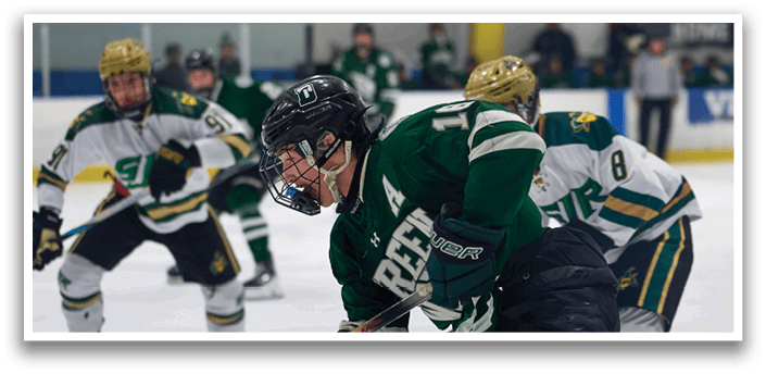 A hockey player in a green jersey is holding a hockey stick and looking down at the ice. AI generated content