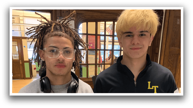 Two young men wearing sports jerseys and glasses pose for a picture. AI generated content