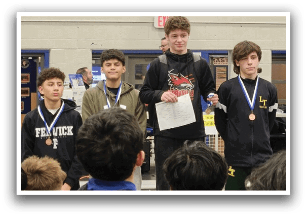 Three boys stand on a stage, each holding a medal. They are surrounded by a crowd of people who are watching them. The boys are wearing black shirts and are the center of attention. AI generated content