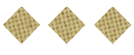 Three diamond-shaped waffle pieces arranged in a horizontal row on a white background. Description generated by AI