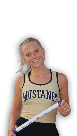 A person wearing a Mustangs tank top and a black skirt is smiling and holding a blue and white relay baton. Description generated by AI