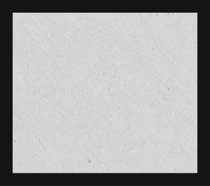 A white wall with a gray border. Description generated by AI