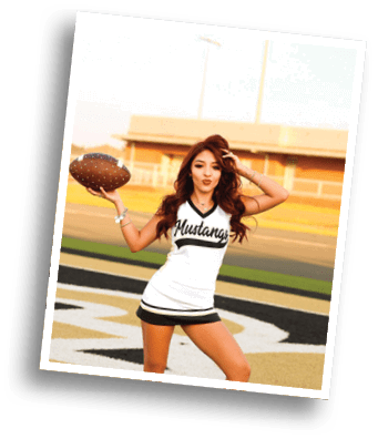 Person with long wavy hair wearing a white sports jersey with black trim and the word Mustangs written on it is posing outdoors. Description generated by AI