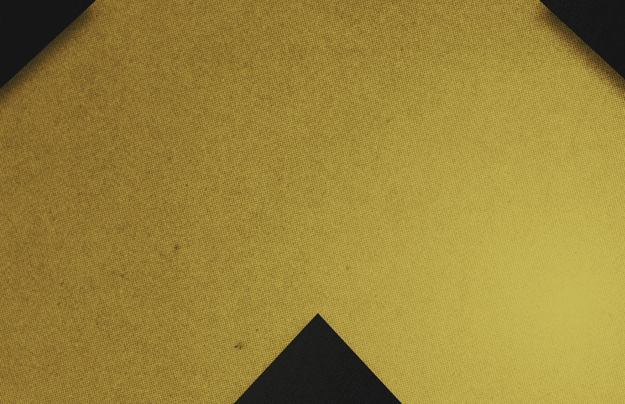 A red and black triangle. Description generated by AI