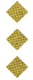 Three diamond-shaped waffle pieces with a golden-brown color and grid pattern are arranged in a row on a white background. Description generated by AI